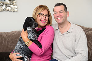 Helen & Darren with their puppy after a stress-free move