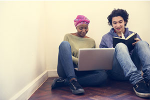 a pair of young people applying for a mortgage
